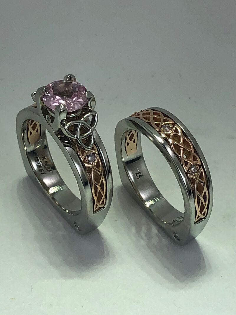 A pair of custom rings with engraved detail