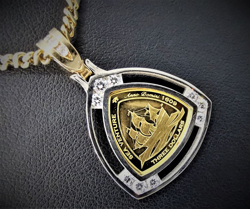 A custom two-tone gold pendant made by Artemis Jewellers